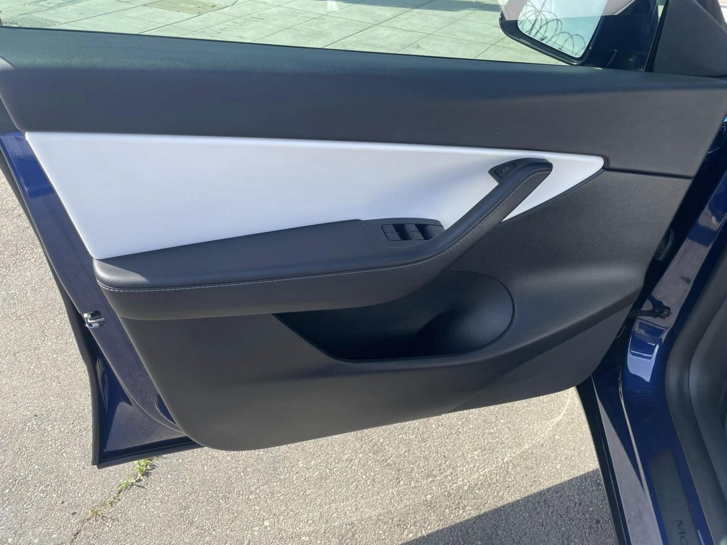 2022 Blue Tesla Model Y Long Range (7SAYGDEE7NF) with an ELECTRIC engine, 1A transmission, located at 744 E Miner Ave, Stockton, CA, 95202, (209) 944-5770, 37.956863, -121.282082 - Photo#4