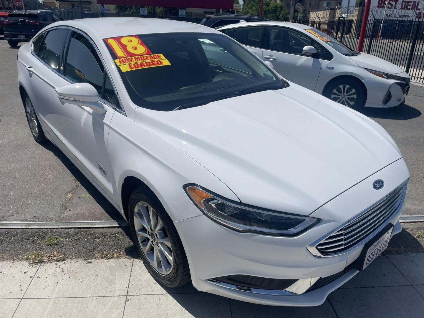 2018 WHITE Ford Fusion Energi SE (3FA6P0PUXJR) with an 2.0L L4 DOHC 16V HYBRID engine, CVT transmission, located at 744 E Miner Ave, Stockton, CA, 95202, (209) 944-5770, 37.956863, -121.282082 - PLUS TAXES AND FEES NO CHARGER AVAILABLE - Photo#1