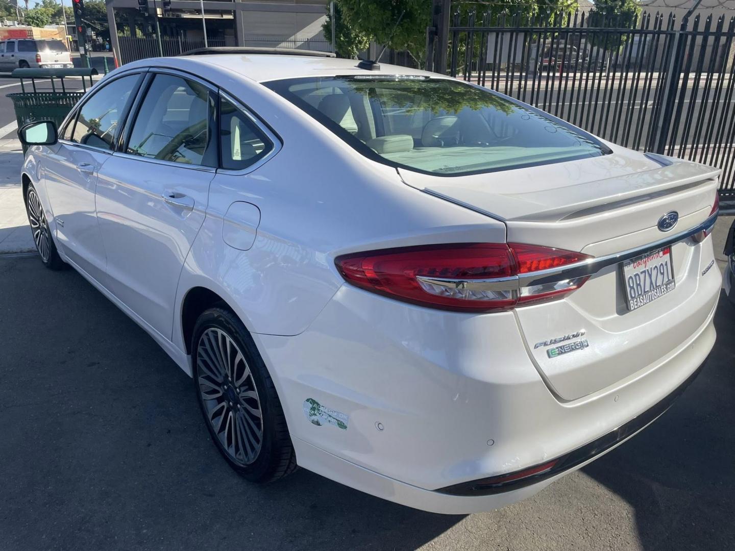 2018 WHITE Ford Fusion Energi Titanium (3FA6P0SU2JR) with an 2.0L L4 DOHC 16V HYBRID engine, CVT transmission, located at 744 E Miner Ave, Stockton, CA, 95202, (209) 944-5770, 37.956863, -121.282082 - PLUS TAXES AND FEES NO CHARGER AVAILABLE - Photo#12