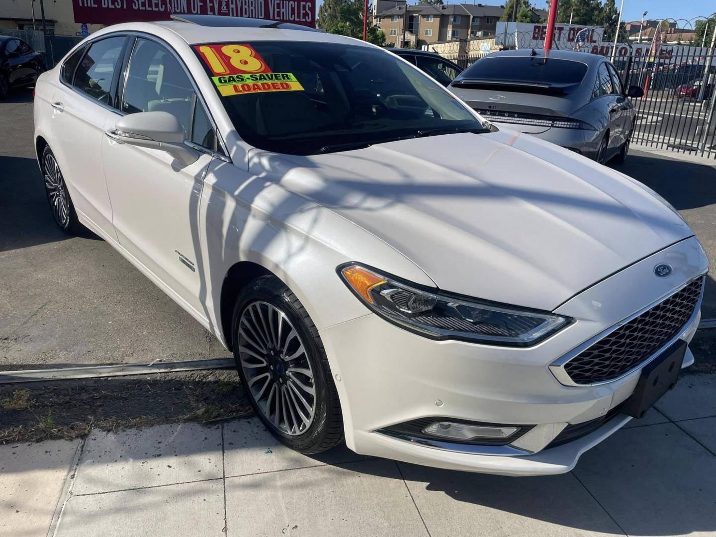 2018 WHITE Ford Fusion Energi Titanium (3FA6P0SU2JR) with an 2.0L L4 DOHC 16V HYBRID engine, CVT transmission, located at 744 E Miner Ave, Stockton, CA, 95202, (209) 944-5770, 37.956863, -121.282082 - PLUS TAXES AND FEES NO CHARGER AVAILABLE - Photo#0