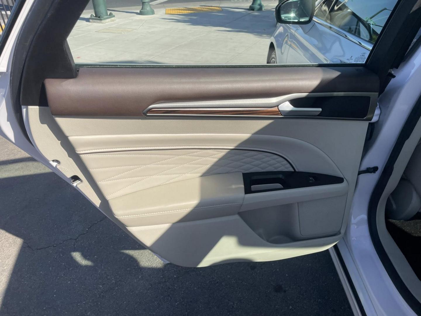 2018 WHITE Ford Fusion Energi Titanium (3FA6P0SU2JR) with an 2.0L L4 DOHC 16V HYBRID engine, CVT transmission, located at 744 E Miner Ave, Stockton, CA, 95202, (209) 944-5770, 37.956863, -121.282082 - PLUS TAXES AND FEES NO CHARGER AVAILABLE - Photo#9