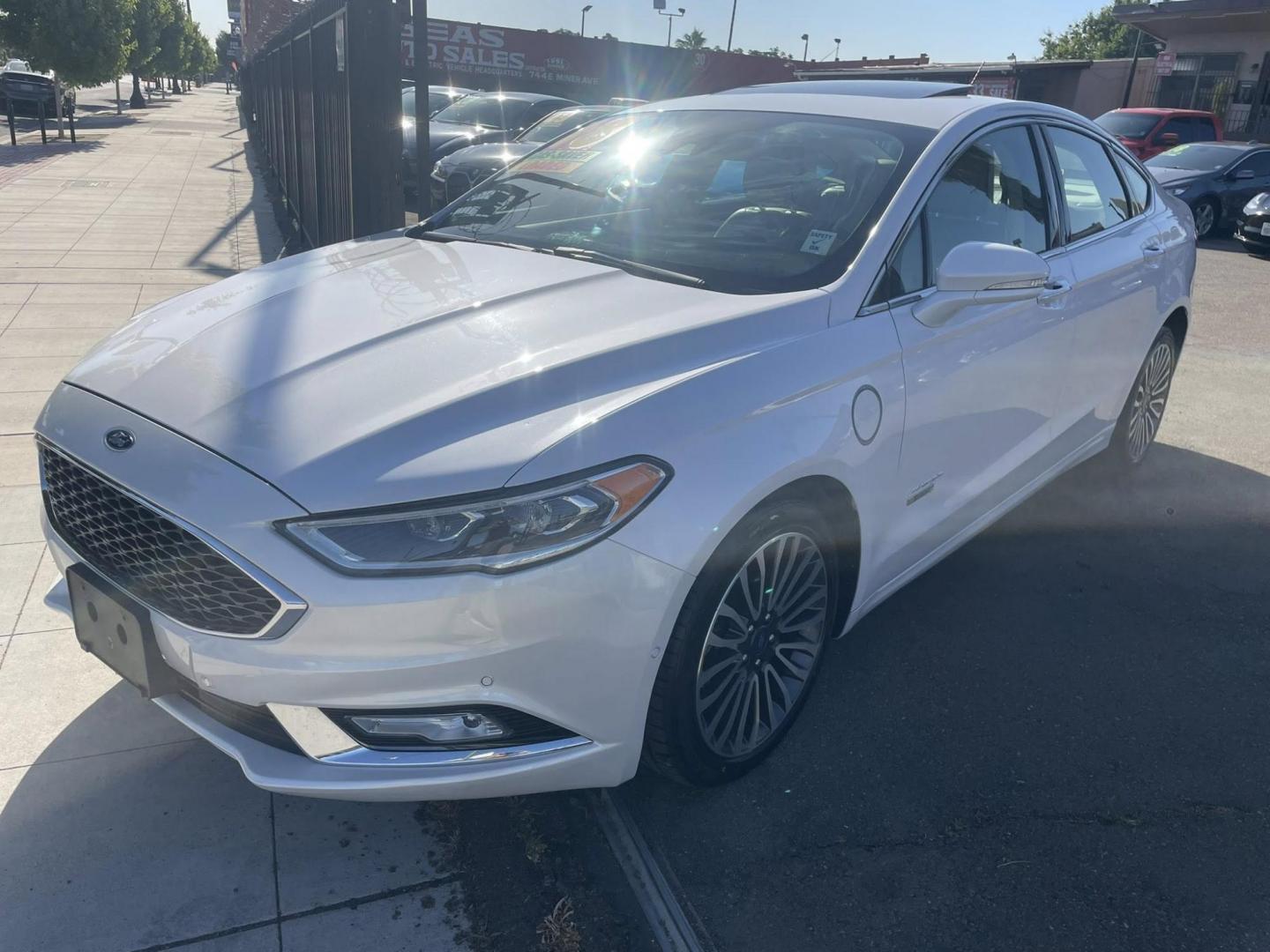 2018 WHITE Ford Fusion Energi Titanium (3FA6P0SU2JR) with an 2.0L L4 DOHC 16V HYBRID engine, CVT transmission, located at 744 E Miner Ave, Stockton, CA, 95202, (209) 944-5770, 37.956863, -121.282082 - PLUS TAXES AND FEES NO CHARGER AVAILABLE - Photo#3