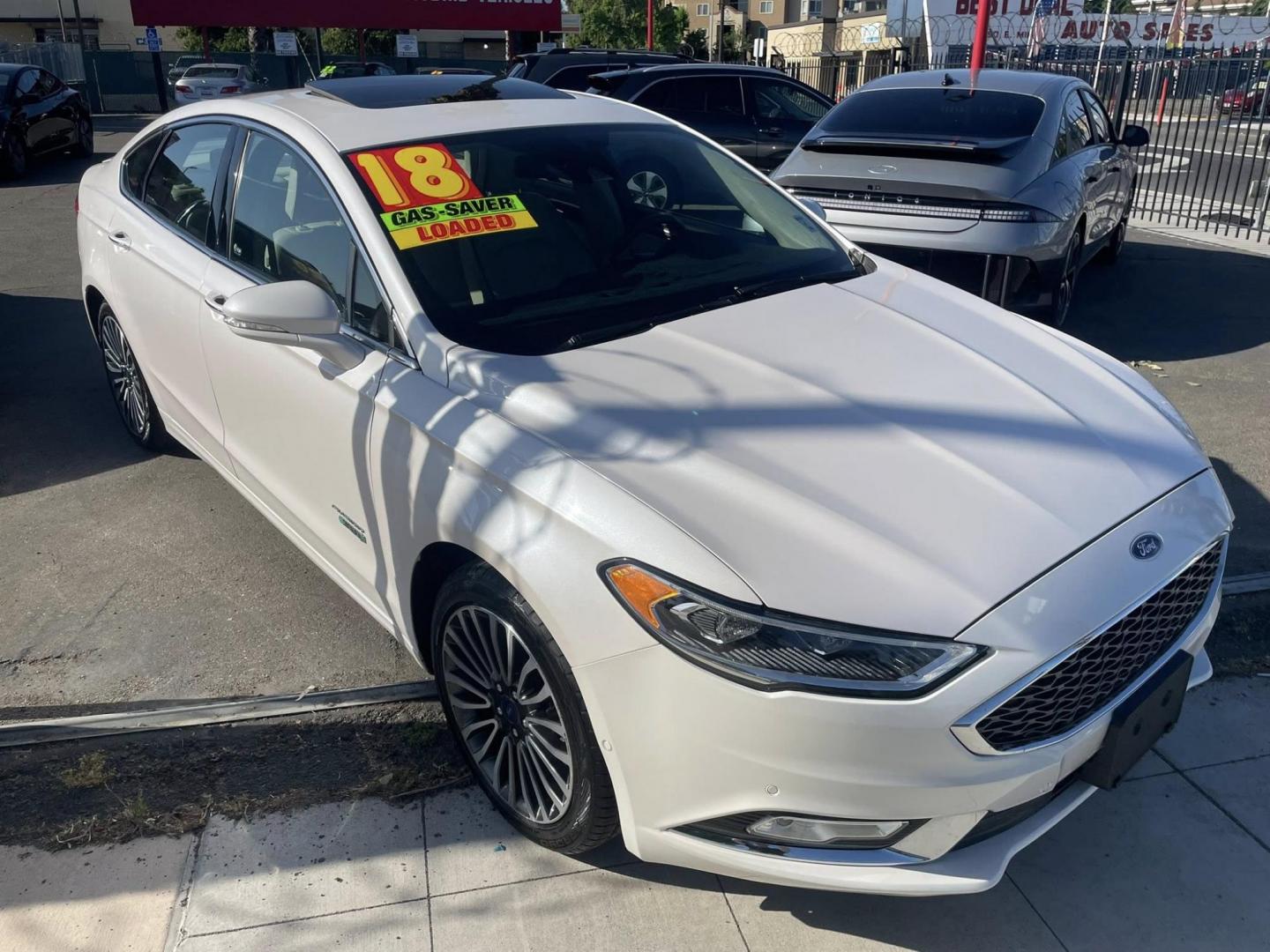 2018 WHITE Ford Fusion Energi Titanium (3FA6P0SU2JR) with an 2.0L L4 DOHC 16V HYBRID engine, CVT transmission, located at 744 E Miner Ave, Stockton, CA, 95202, (209) 944-5770, 37.956863, -121.282082 - PLUS TAXES AND FEES NO CHARGER AVAILABLE - Photo#1