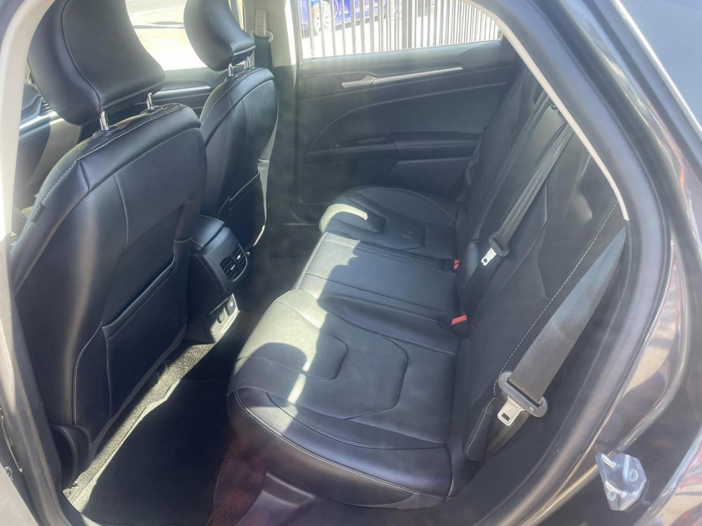 2018 Ford Fusion Energi Titanium (3FA6P0SU5JR) with an 2.0L L4 DOHC 16V HYBRID engine, CVT transmission, located at 744 E Miner Ave, Stockton, CA, 95202, (209) 944-5770, 37.956863, -121.282082 - Photo#7