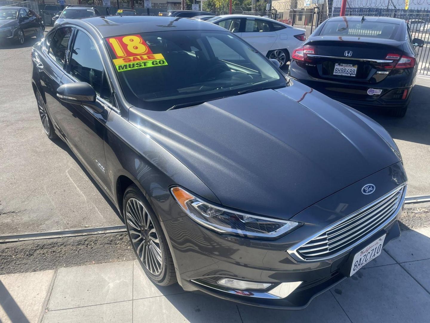 2018 Ford Fusion Energi Titanium (3FA6P0SU5JR) with an 2.0L L4 DOHC 16V HYBRID engine, CVT transmission, located at 744 E Miner Ave, Stockton, CA, 95202, (209) 944-5770, 37.956863, -121.282082 - Photo#1
