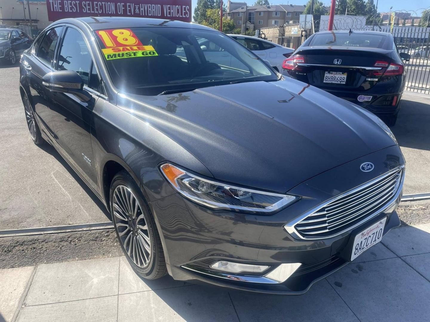 2018 Ford Fusion Energi Titanium (3FA6P0SU5JR) with an 2.0L L4 DOHC 16V HYBRID engine, CVT transmission, located at 744 E Miner Ave, Stockton, CA, 95202, (209) 944-5770, 37.956863, -121.282082 - Photo#0