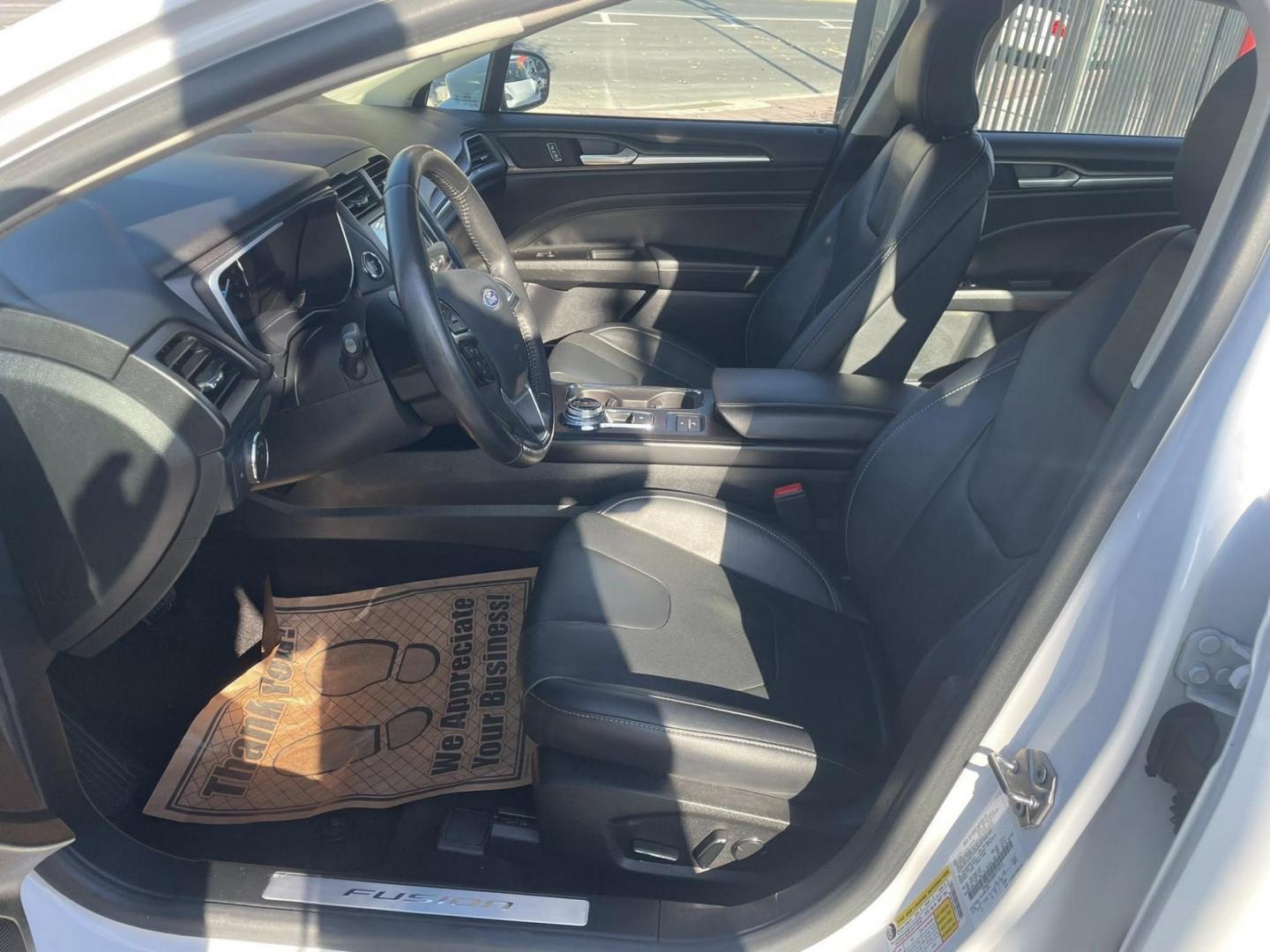 2019 Ford Fusion Energi Titanium (3FA6P0SU0KR) with an 2.0L L4 DOHC 16V HYBRID engine, CVT transmission, located at 744 E Miner Ave, Stockton, CA, 95202, (209) 944-5770, 37.956863, -121.282082 - PLUS TAXES AND FEES - Photo#7