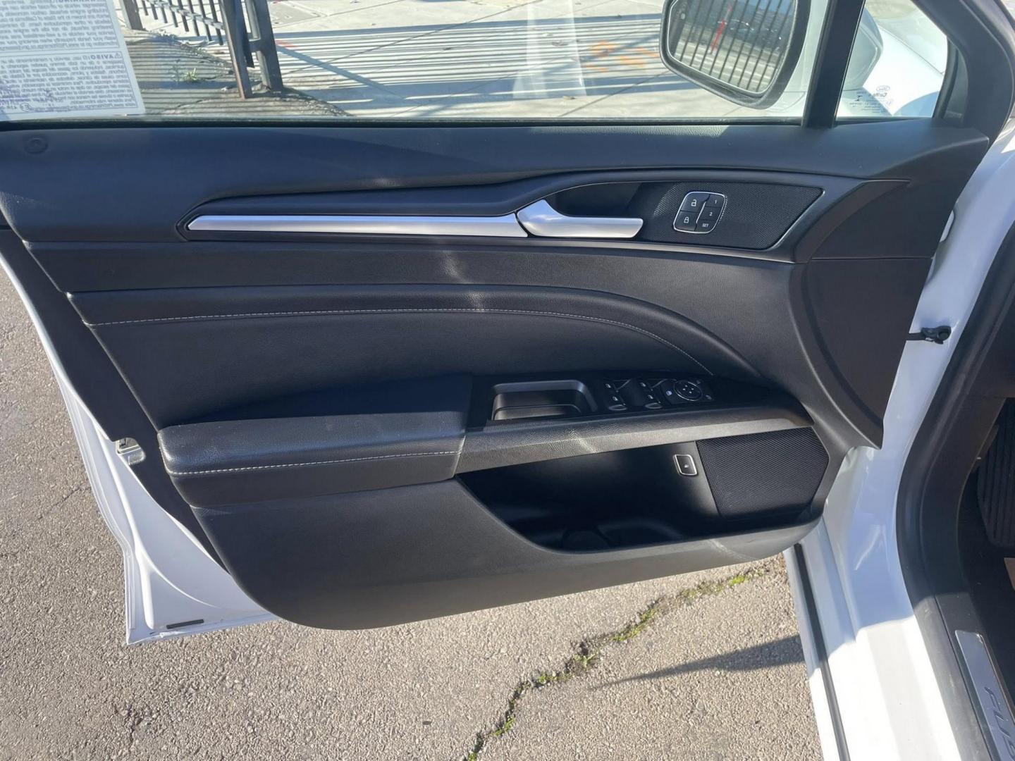2019 Ford Fusion Energi Titanium (3FA6P0SU0KR) with an 2.0L L4 DOHC 16V HYBRID engine, CVT transmission, located at 744 E Miner Ave, Stockton, CA, 95202, (209) 944-5770, 37.956863, -121.282082 - PLUS TAXES AND FEES - Photo#4