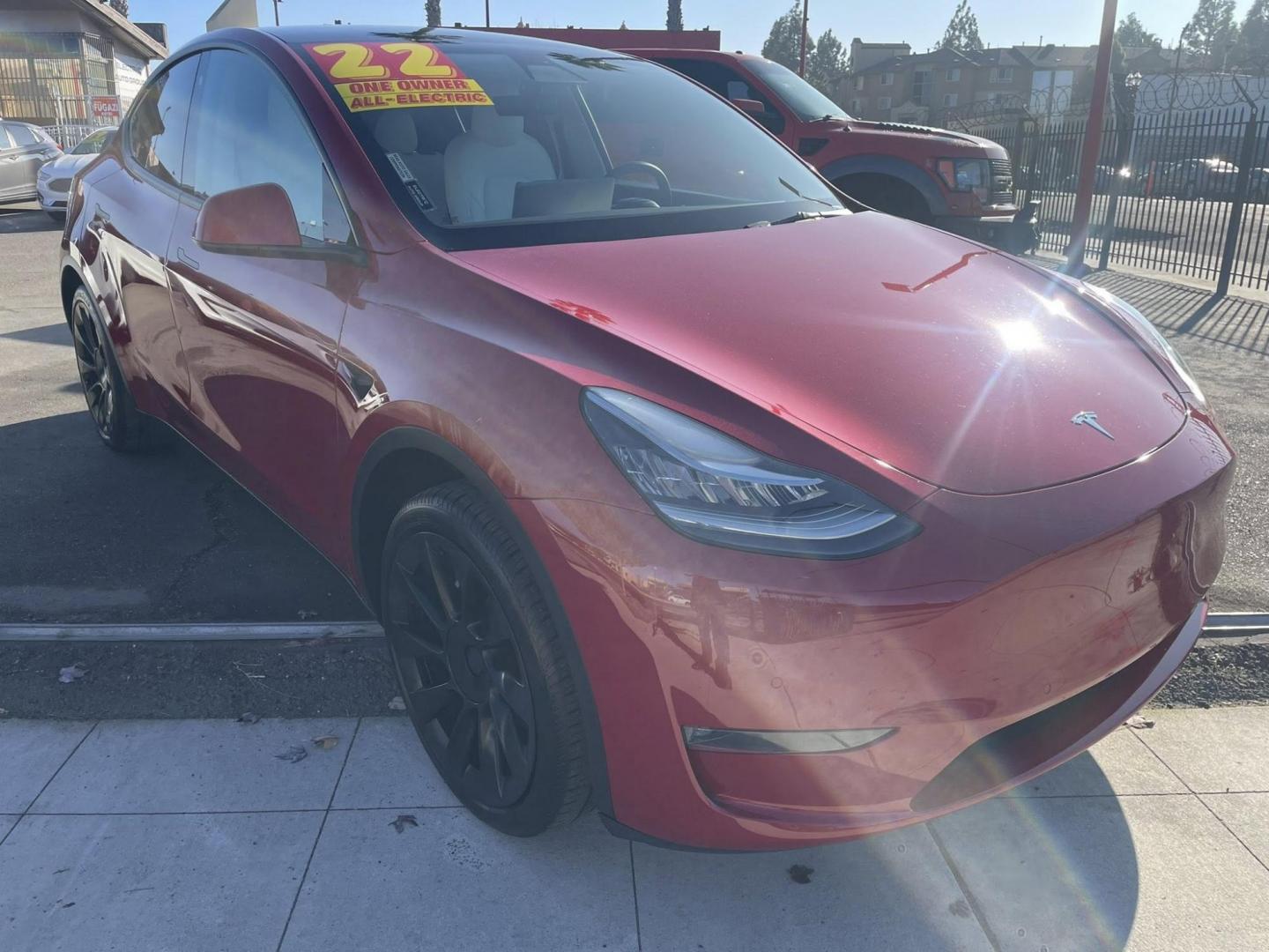 2022 RED Tesla Model Y Long Range (7SAYGDEE1NF) with an ELECTRIC engine, 1A transmission, located at 744 E Miner Ave, Stockton, CA, 95202, (209) 944-5770, 37.956863, -121.282082 - PLUS TAXES AND FEES - Photo#0