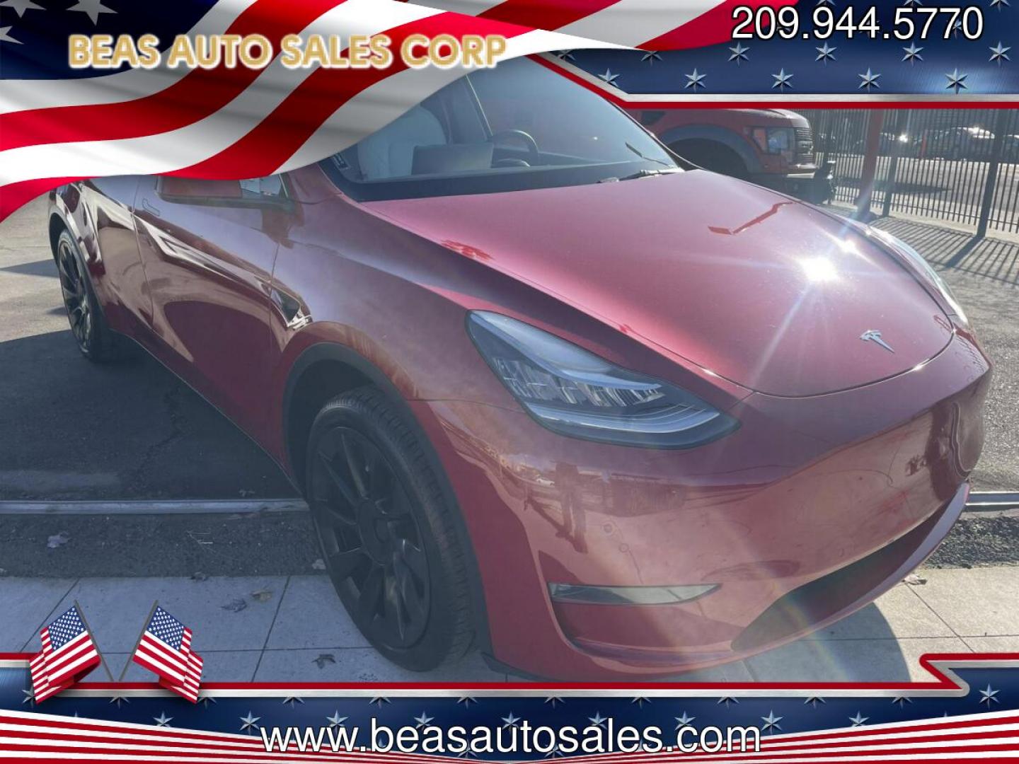 2022 RED Tesla Model Y Long Range (7SAYGDEE1NF) with an ELECTRIC engine, 1A transmission, located at 744 E Miner Ave, Stockton, CA, 95202, (209) 944-5770, 37.956863, -121.282082 - PLUS TAXES AND FEES- Photo#0