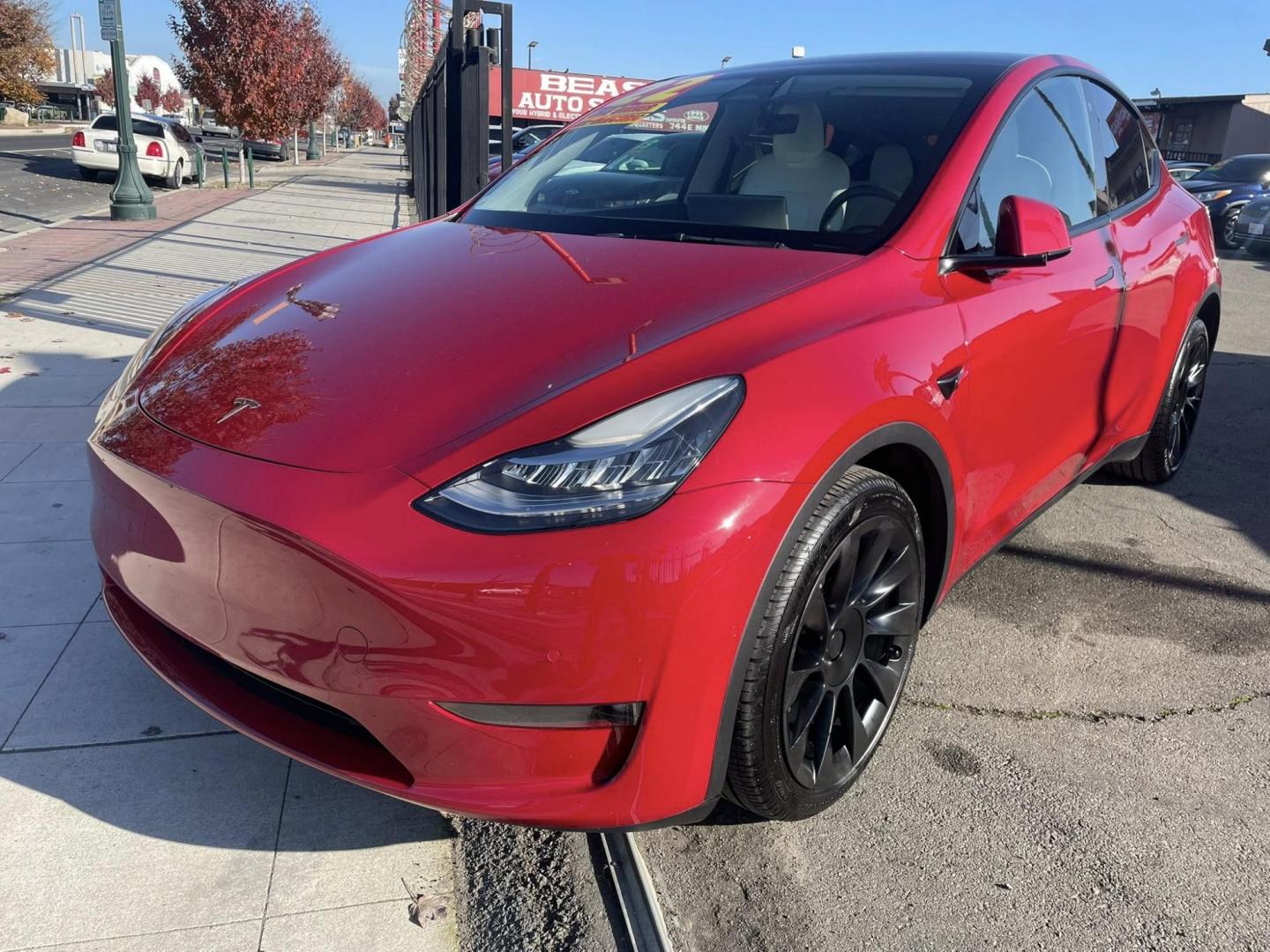 2022 RED Tesla Model Y Long Range (7SAYGDEE1NF) with an ELECTRIC engine, 1A transmission, located at 744 E Miner Ave, Stockton, CA, 95202, (209) 944-5770, 37.956863, -121.282082 - PLUS TAXES AND FEES - Photo#3