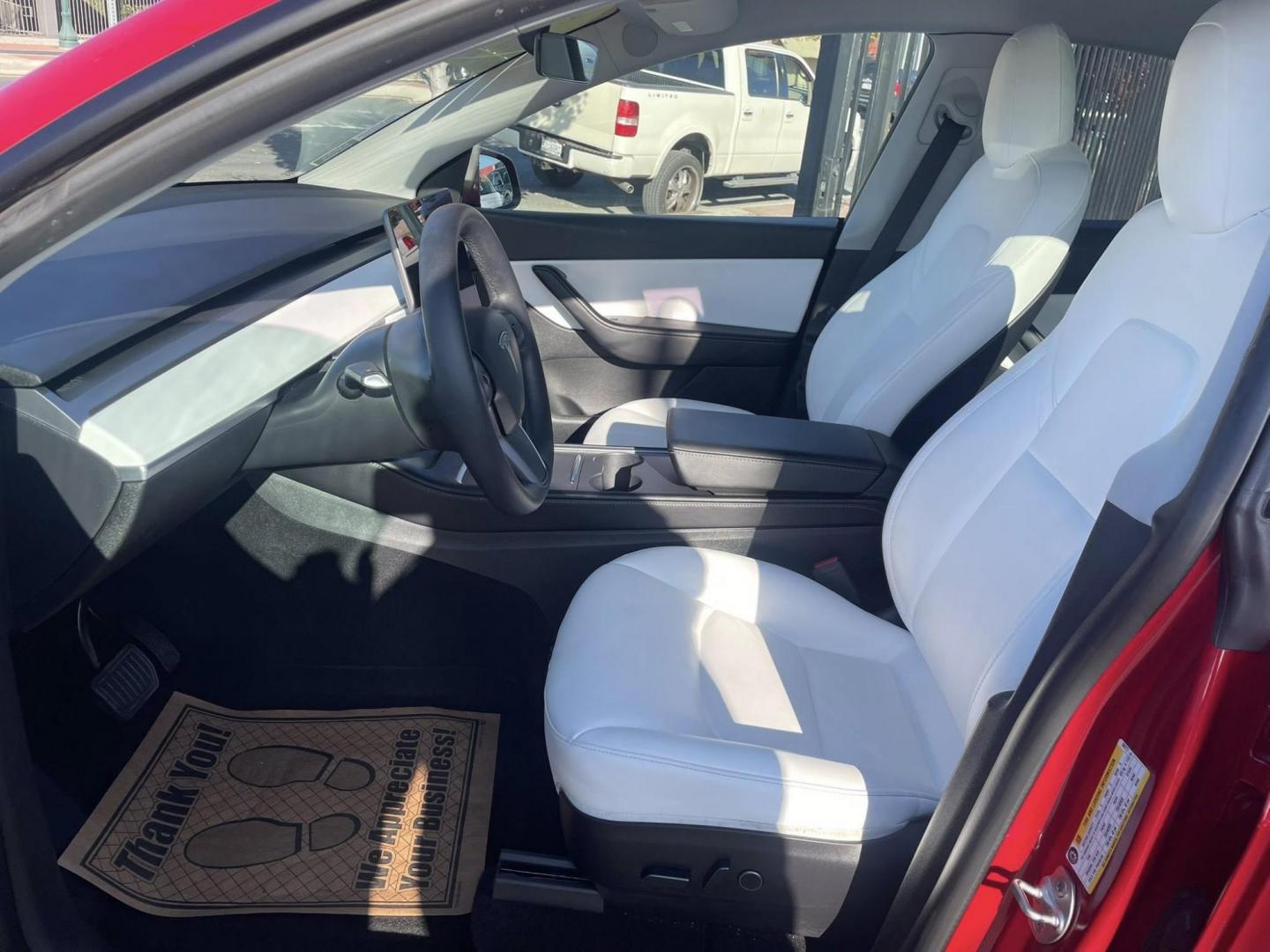 2022 RED Tesla Model Y Long Range (7SAYGDEE1NF) with an ELECTRIC engine, 1A transmission, located at 744 E Miner Ave, Stockton, CA, 95202, (209) 944-5770, 37.956863, -121.282082 - PLUS TAXES AND FEES - Photo#5