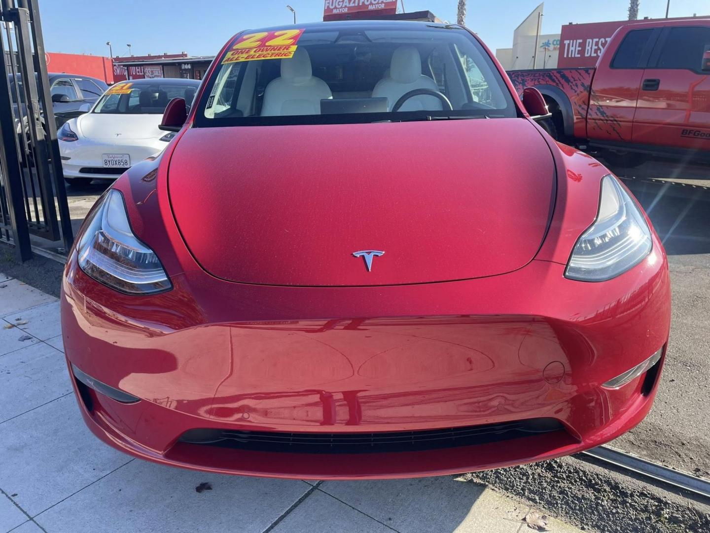 2022 RED Tesla Model Y Long Range (7SAYGDEE1NF) with an ELECTRIC engine, 1A transmission, located at 744 E Miner Ave, Stockton, CA, 95202, (209) 944-5770, 37.956863, -121.282082 - PLUS TAXES AND FEES - Photo#2