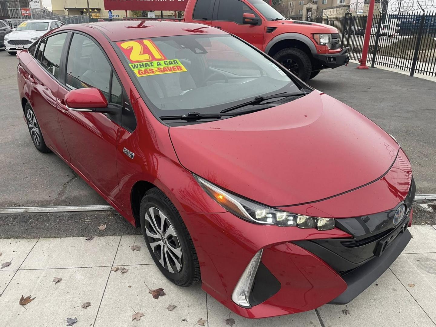 2021 Toyota Prius Prime LE (JTDKAMFPXM3) with an 1.8L L4 DOHC 16V HYBRID engine, CVT transmission, located at 744 E Miner Ave, Stockton, CA, 95202, (209) 944-5770, 37.956863, -121.282082 - PLUS TAXES AND FEES - Photo#1