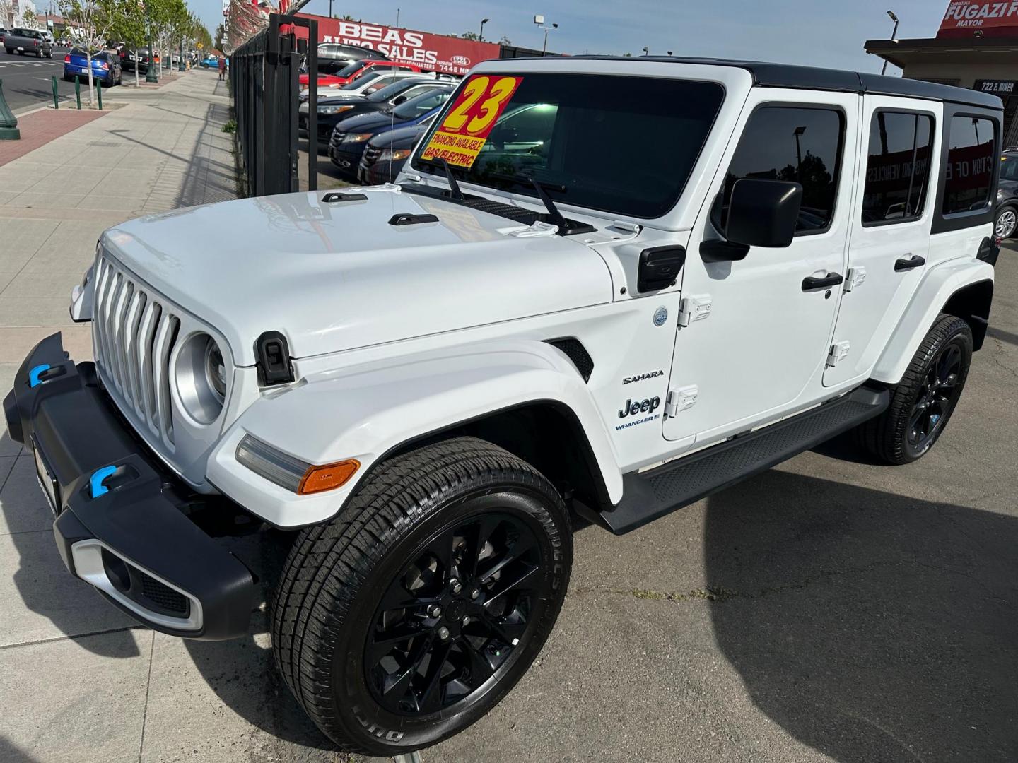 2023 Jeep Wrangler Unlimited Sahara 4XE (1C4JJXP6XPW) with an 2.0L L4 DOHC 16V HYBRID engine, 8A transmission, located at 744 E Miner Ave, Stockton, CA, 95202, (209) 944-5770, 37.956863, -121.282082 - Photo#4