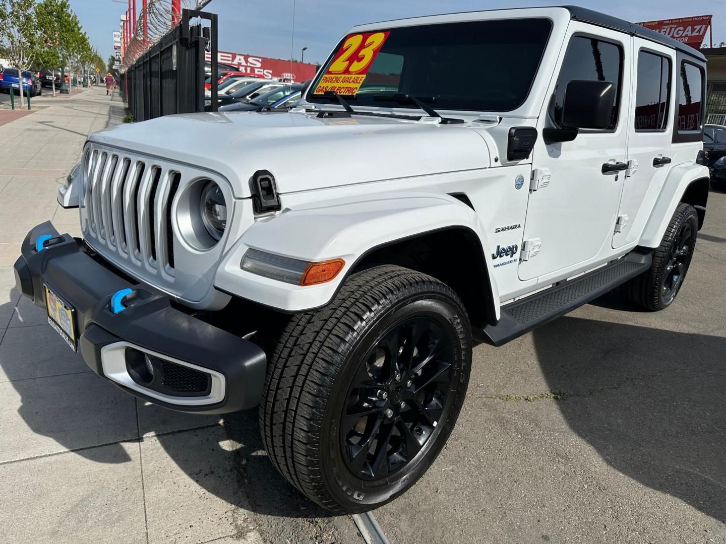 2023 Jeep Wrangler Unlimited Sahara 4XE (1C4JJXP6XPW) with an 2.0L L4 DOHC 16V HYBRID engine, 8A transmission, located at 744 E Miner Ave, Stockton, CA, 95202, (209) 944-5770, 37.956863, -121.282082 - Photo#3