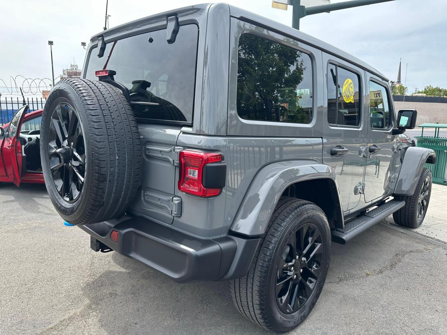 2023 Jeep Wrangler Unlimited Sahara 4XE (1C4JJXP62PW) with an 2.0L L4 DOHC 16V HYBRID engine, 8A transmission, located at 744 E Miner Ave, Stockton, CA, 95202, (209) 944-5770, 37.956863, -121.282082 - Photo#8
