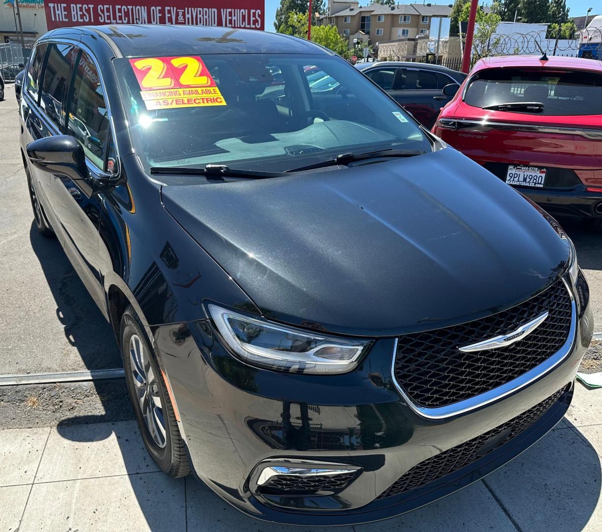 2022 Chrysler Pacifica Hybrid Touring L (2C4RC1L72NR) with an 3.6L V6 DOHC 24V HYBRID engine, CVT transmission, located at 744 E Miner Ave, Stockton, CA, 95202, (209) 944-5770, 37.956863, -121.282082 - Photo#1