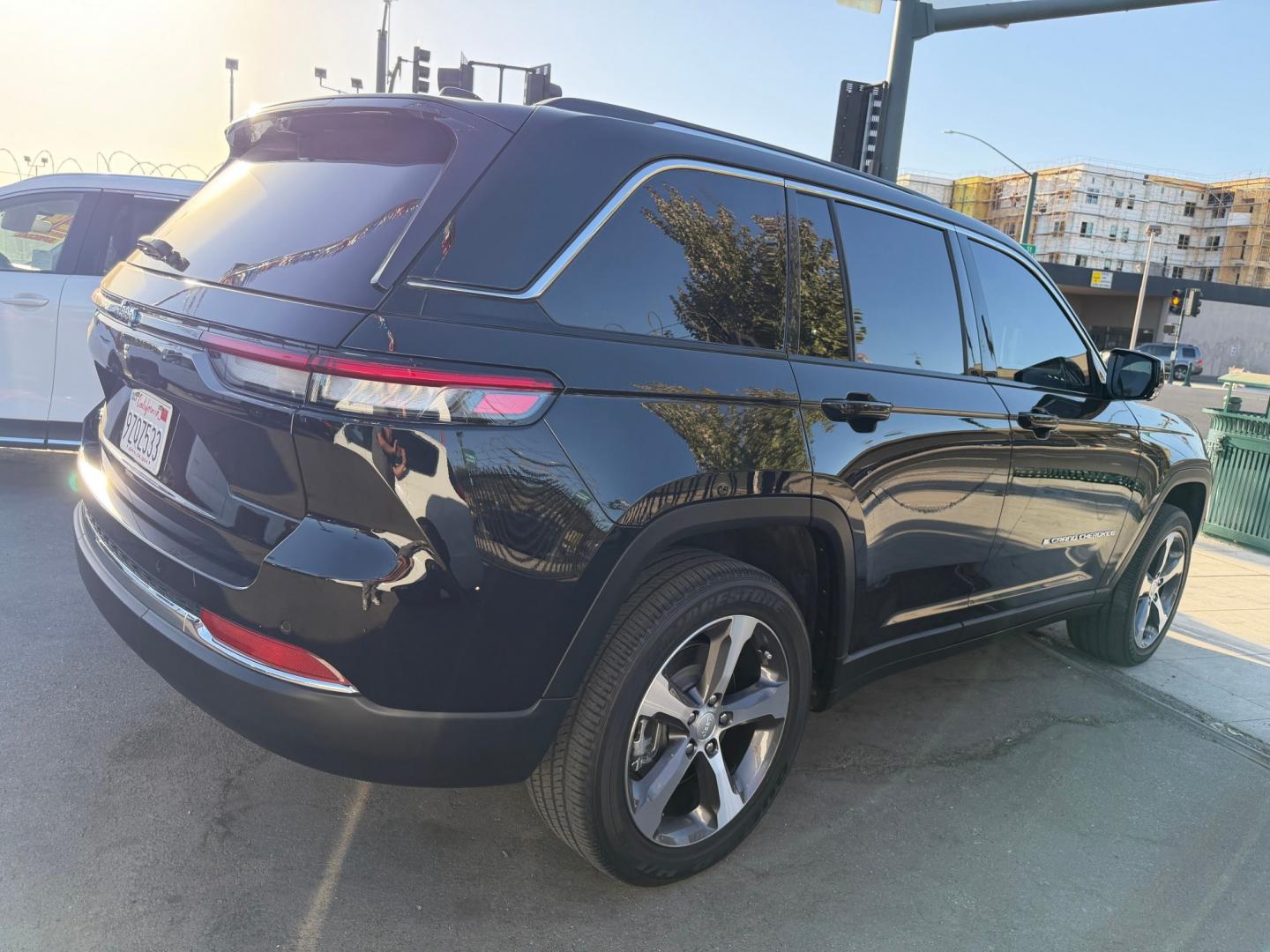 2023 BLACK Jeep Grand Cherokee 4xe Limited (1C4RJYB67PC) with an 2.0L L4 DOHC 16V HYBRID engine, 8A transmission, located at 744 E Miner Ave, Stockton, CA, 95202, (209) 944-5770, 37.956863, -121.282082- Photo#7